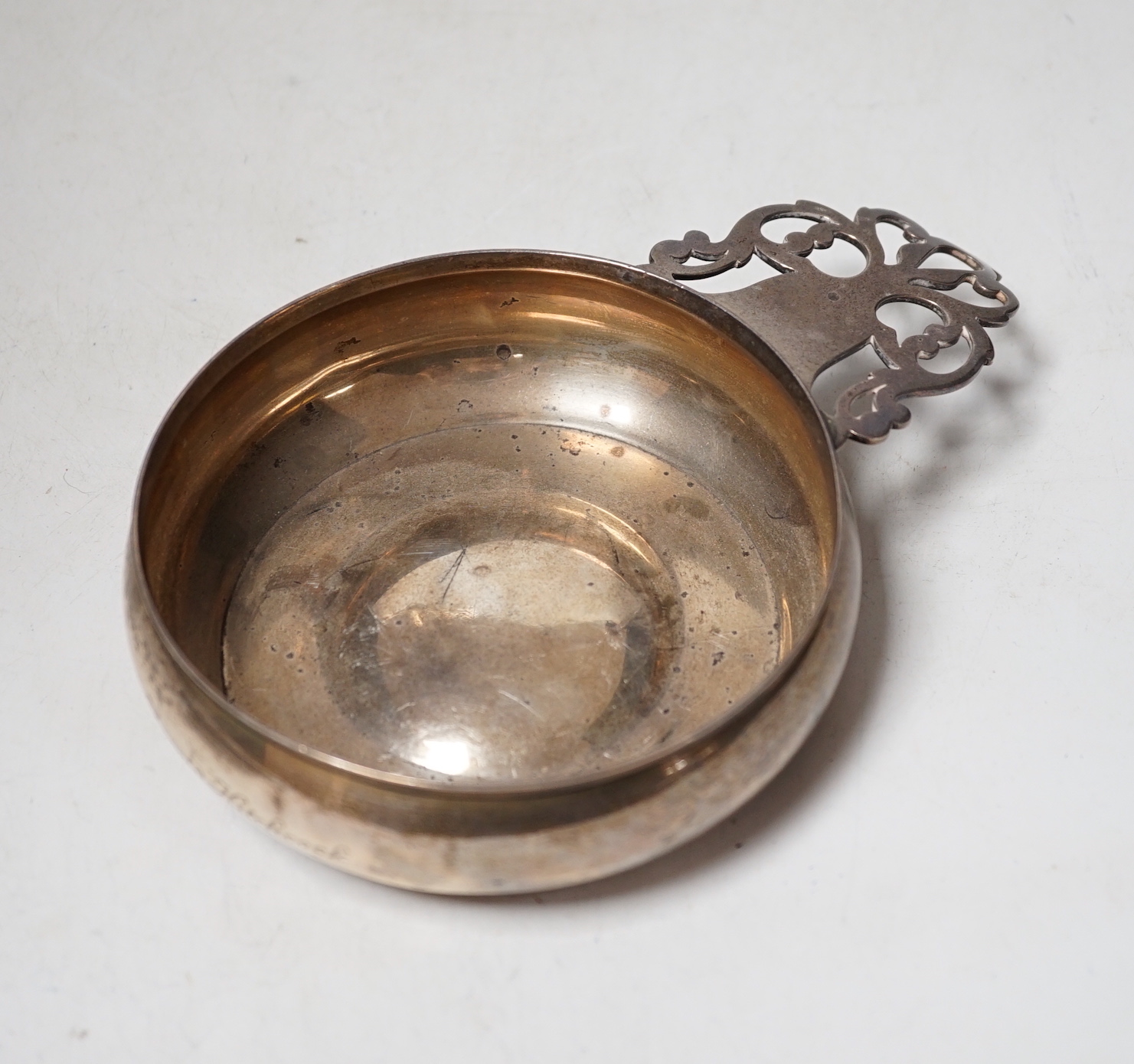 A Tiffany & Co sterling bleeding bowl, a replica of the original in the Clearwater Collection by Paul Revere, 19.3cm including handled, 7.8oz.